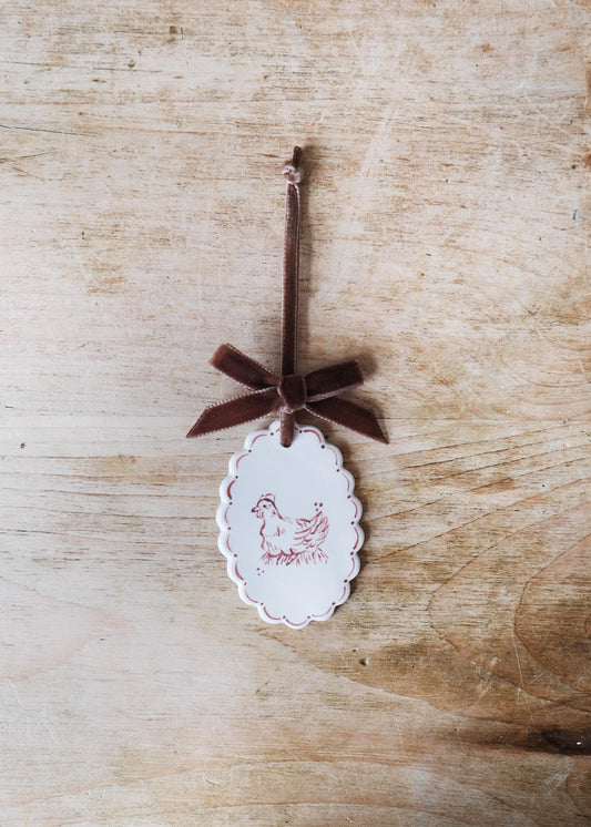 Small brown laying hen wall hanging