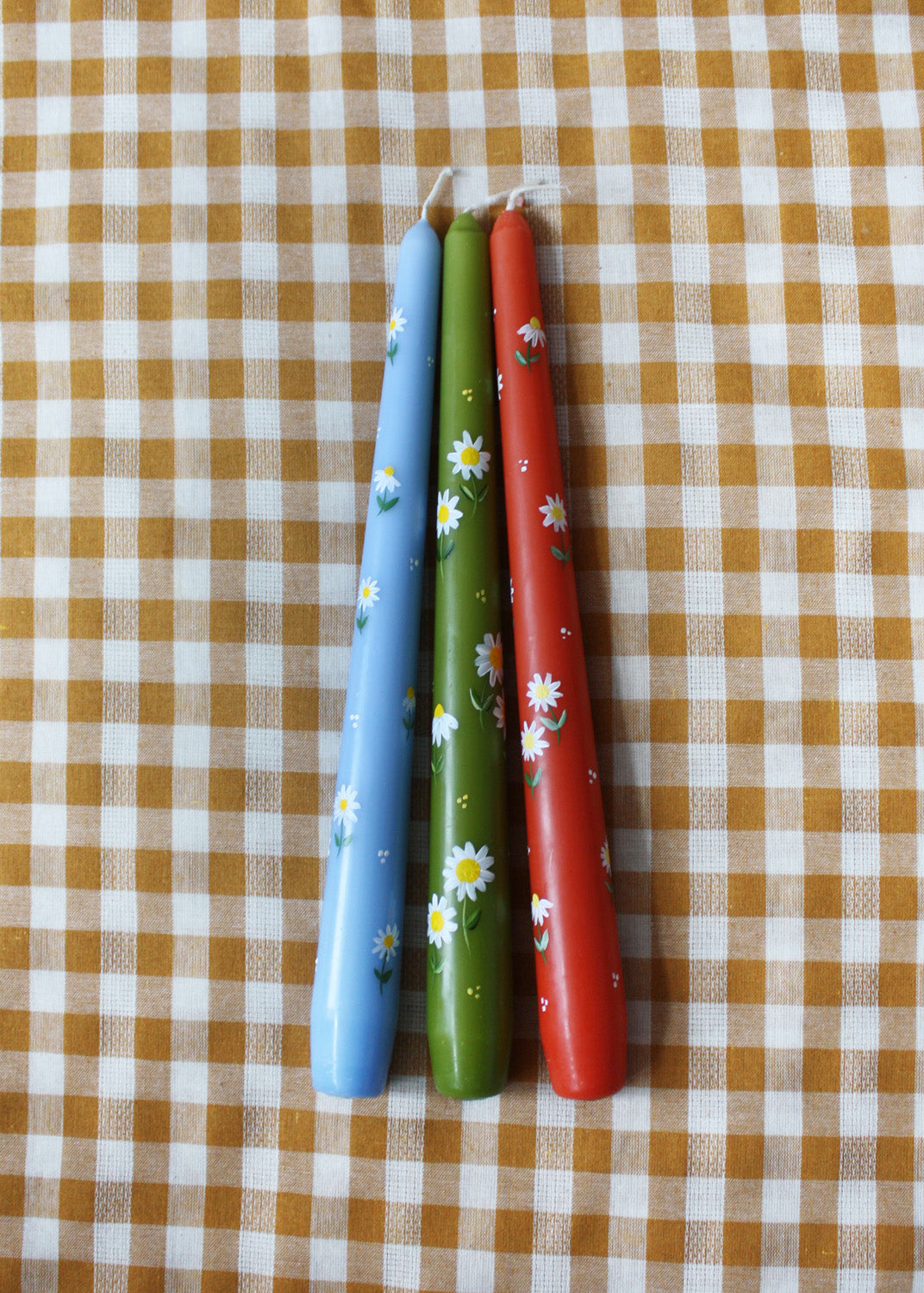 Bougie orange brûlée par Daisy