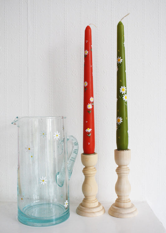 Bougie orange brûlée par Daisy