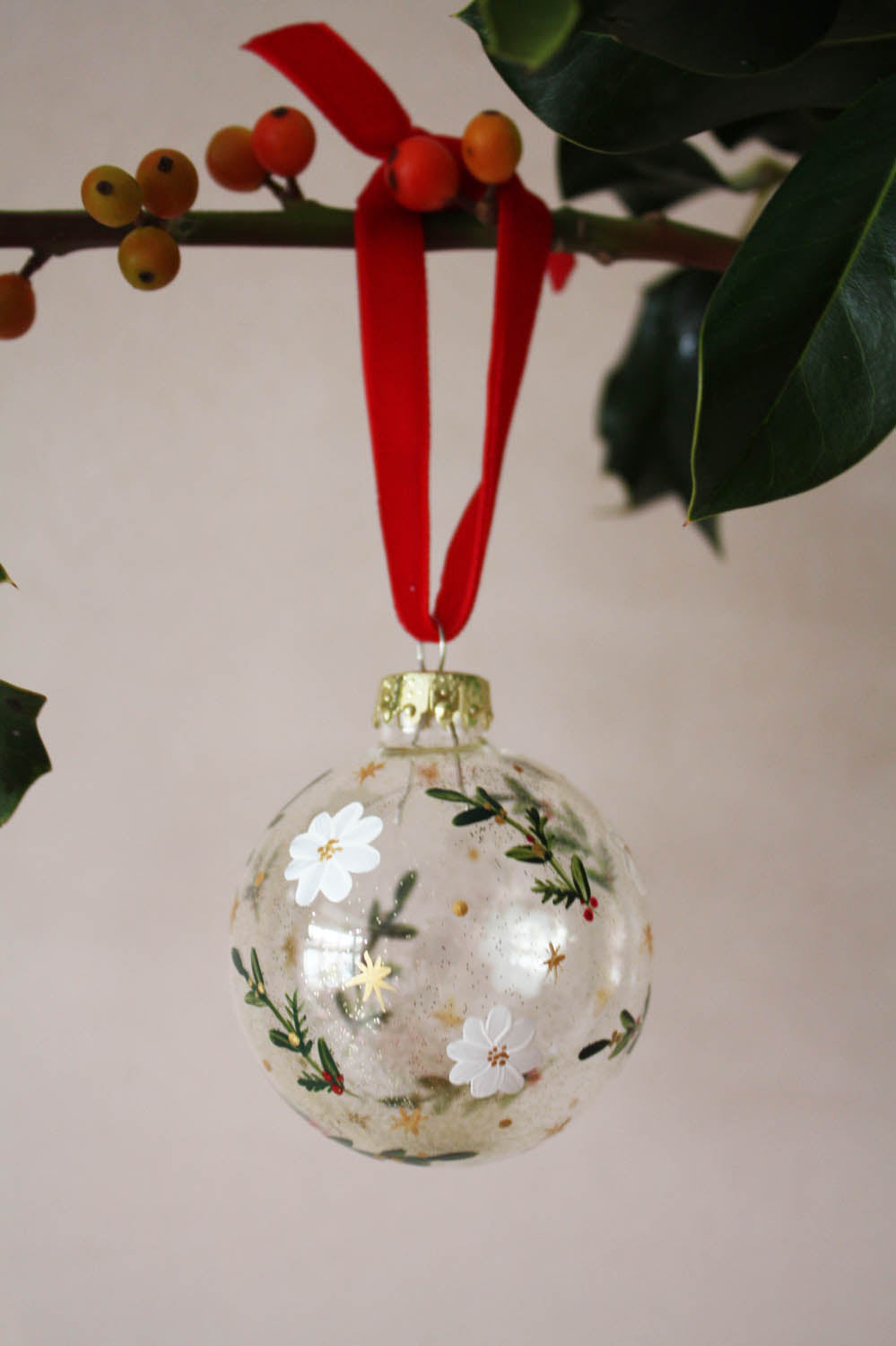 Festive floral glass bauble