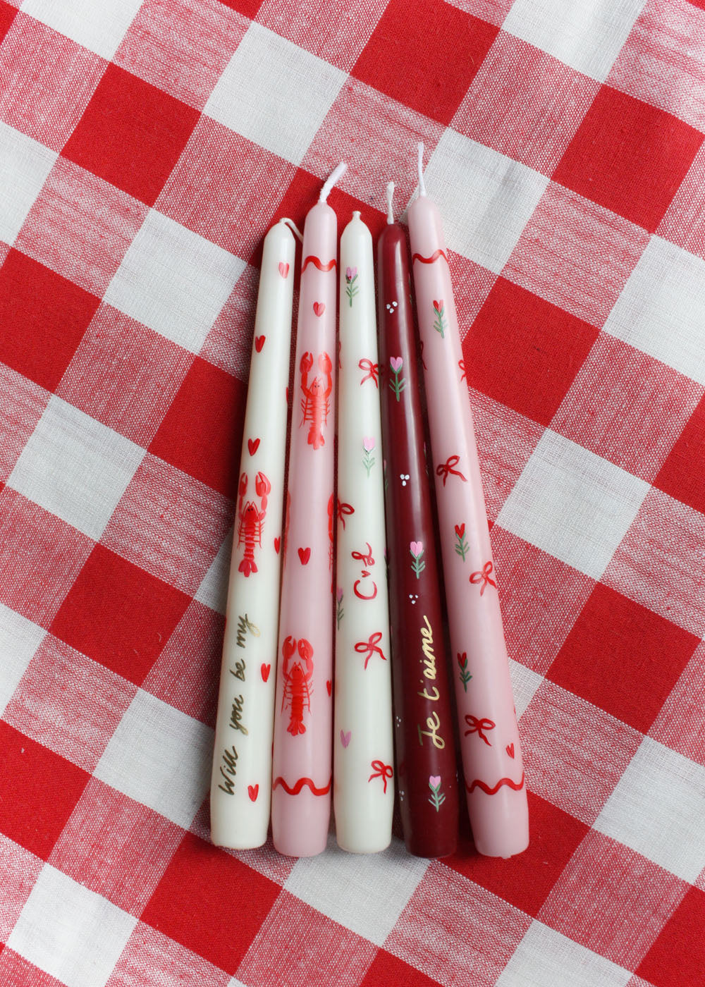Bougie ivoire noeud rouge & coeur rose