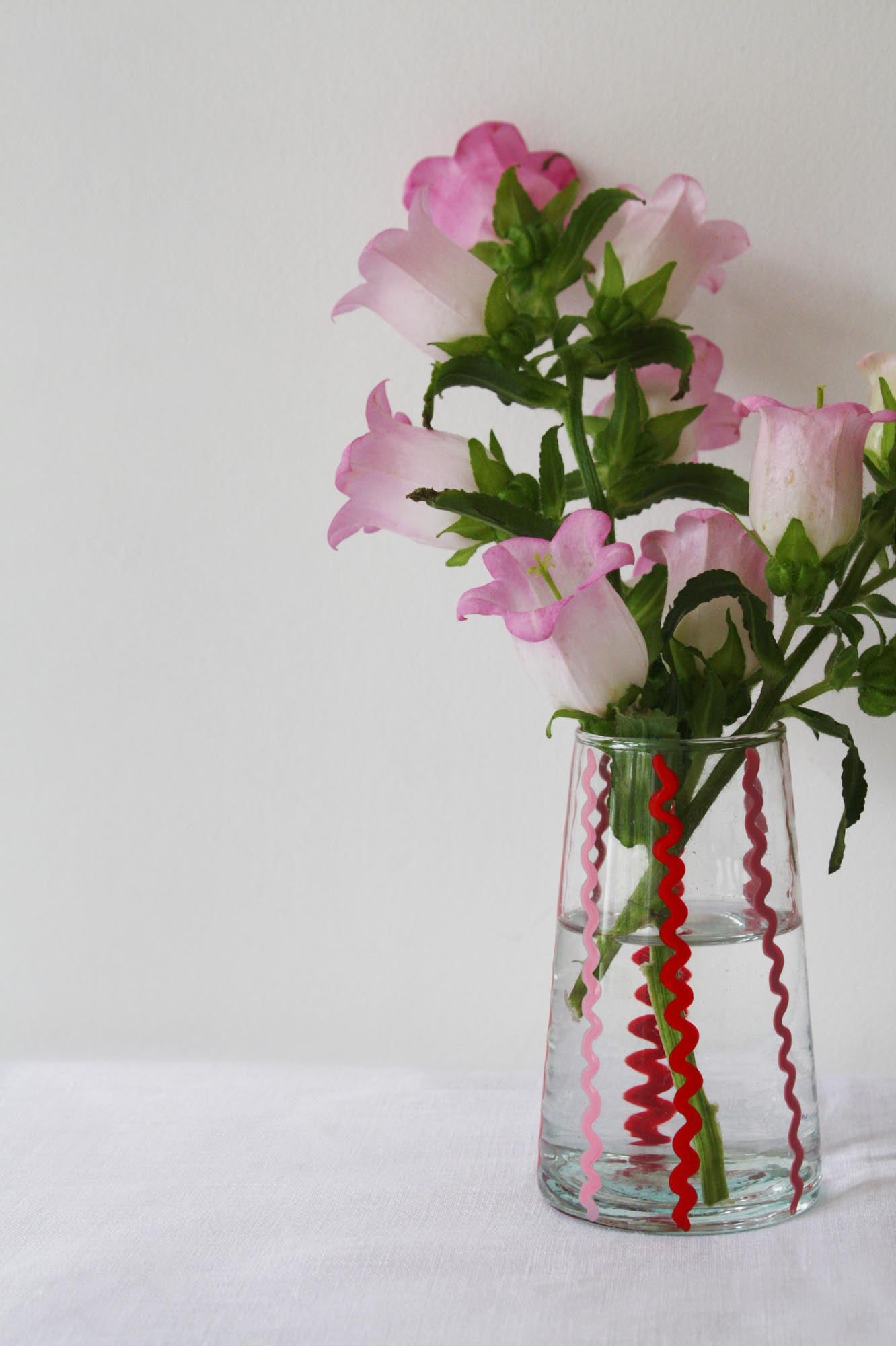Red & pink Moroccan glass wiggle vase