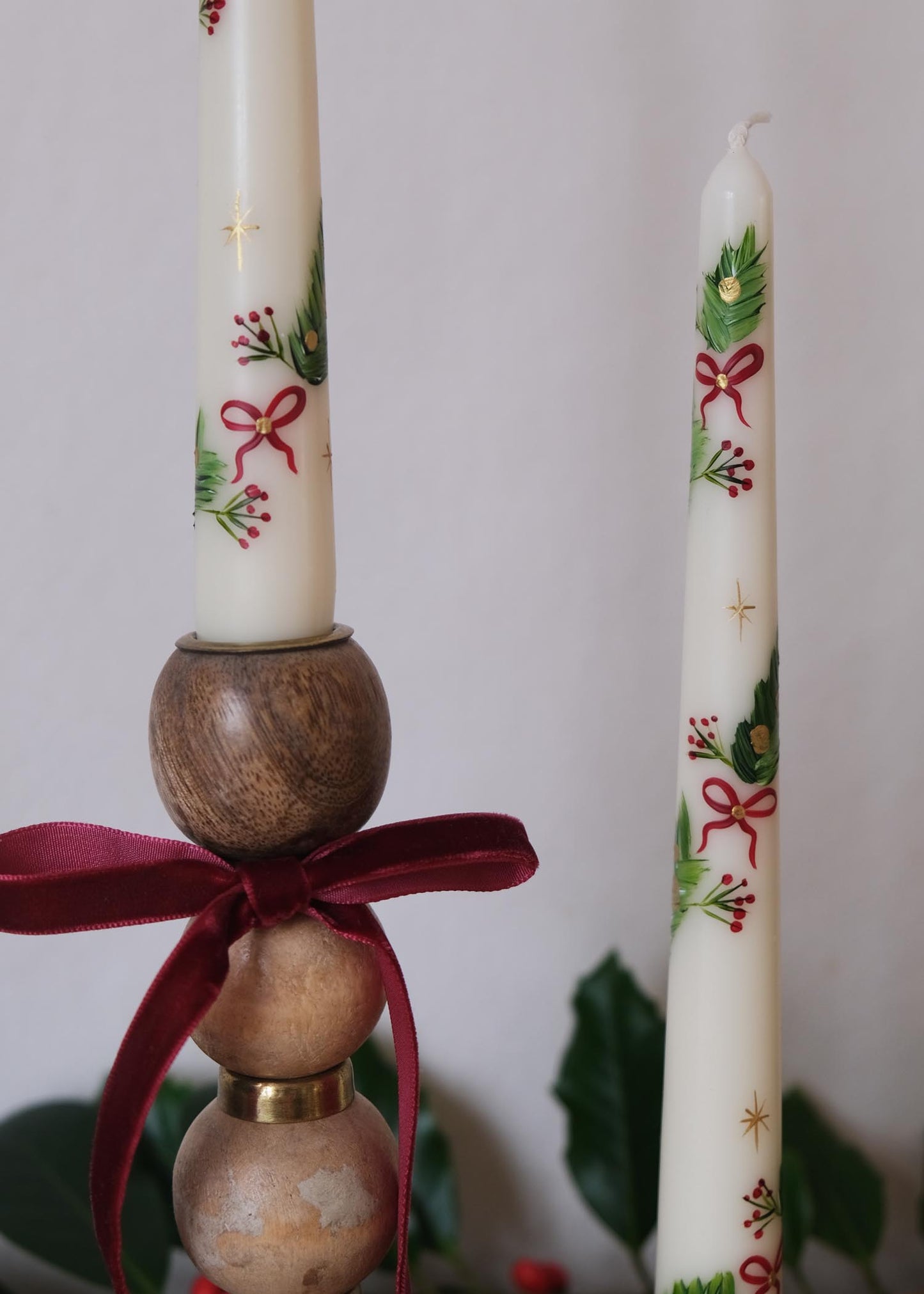 Bougie guirlande noeud en velours rouge