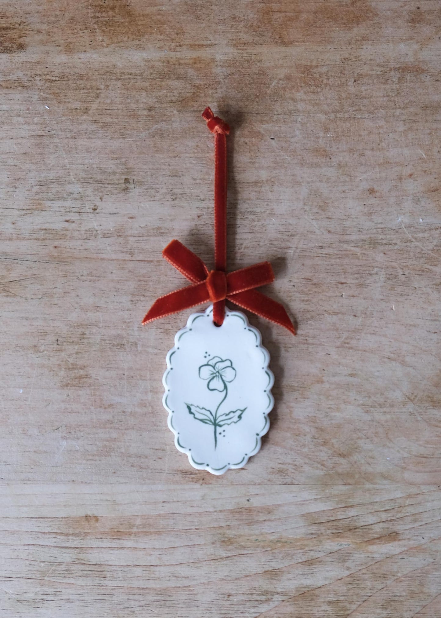 Small green pansy wall hanging