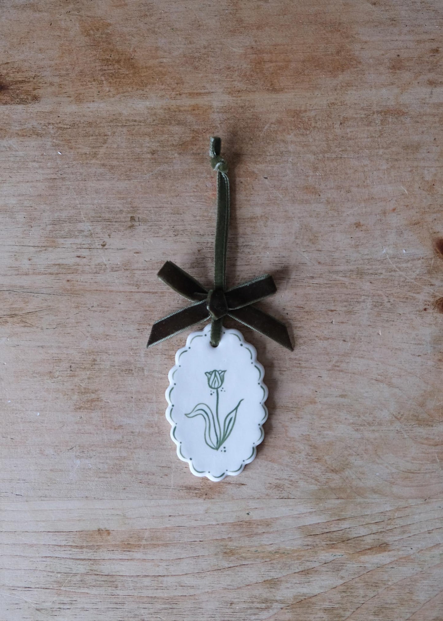 Small green tulip wall hanging