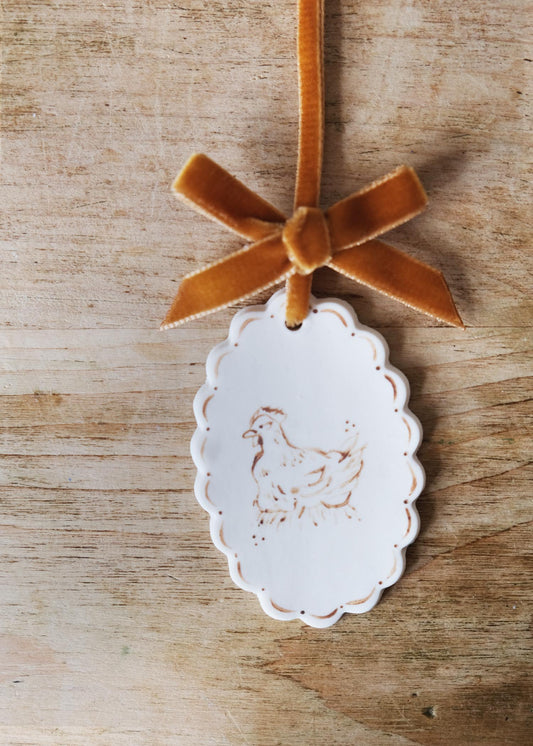 Small golden laying hen wall hanging