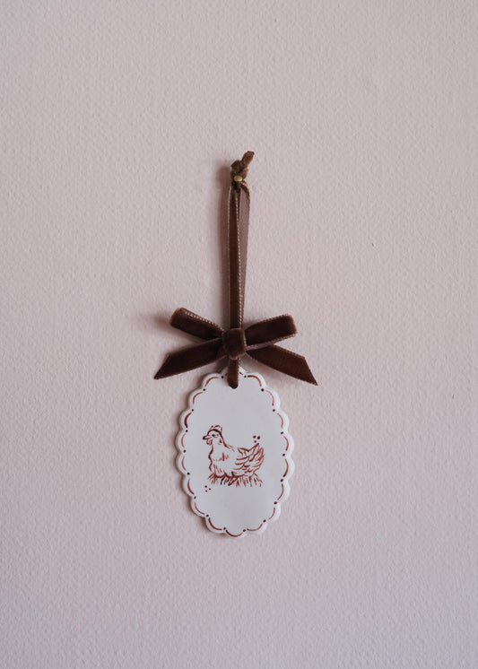 Small brown laying hen wall hanging