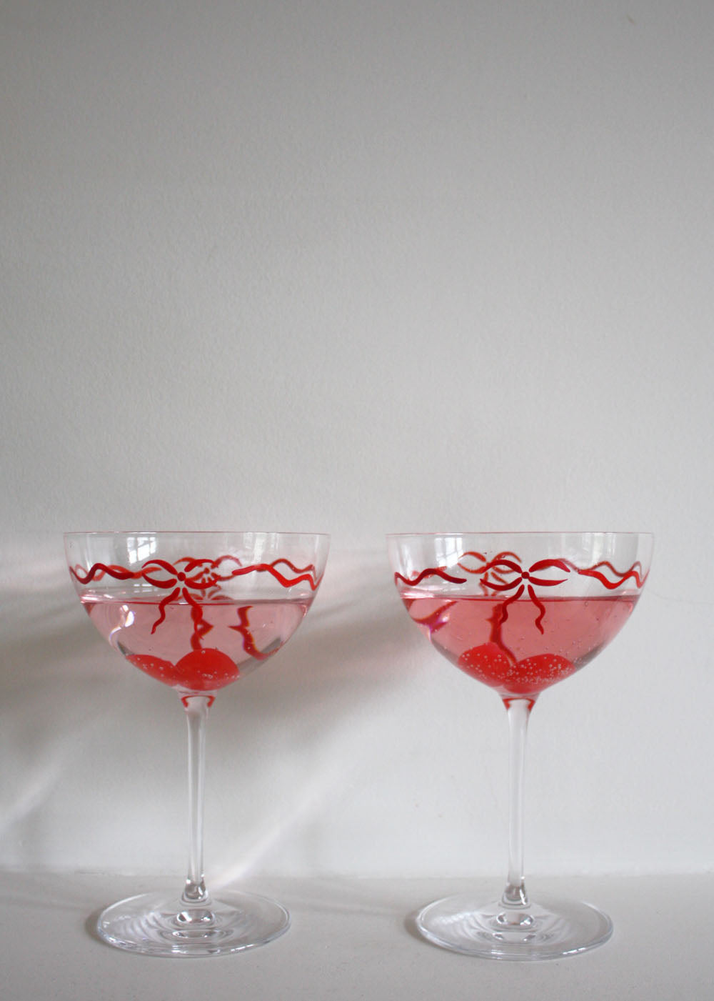 Limited Edition hand painted red bow coupe glasses pair
