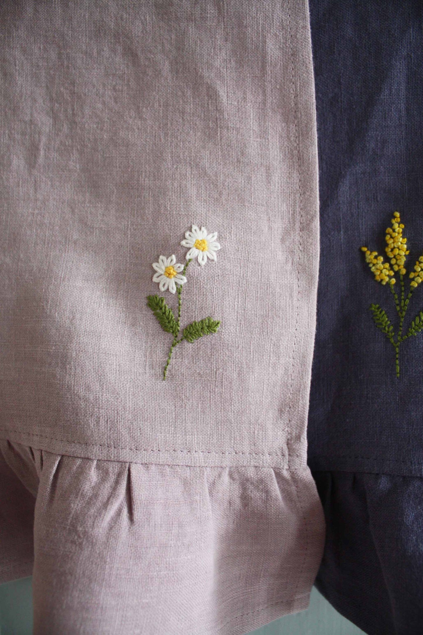 hand embroidered daisy linen ruffle tea towel