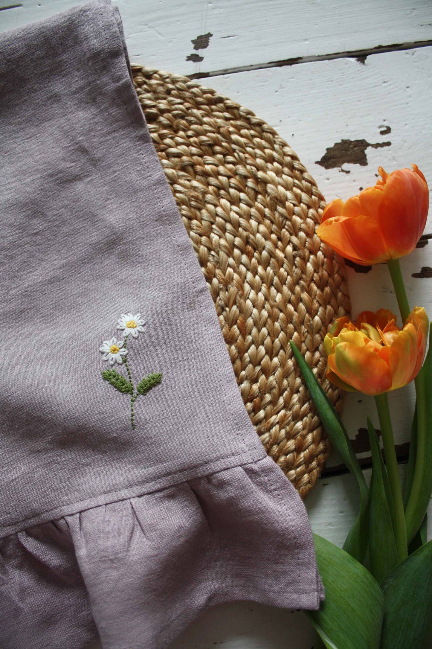 hand embroidered daisy linen ruffle tea towel