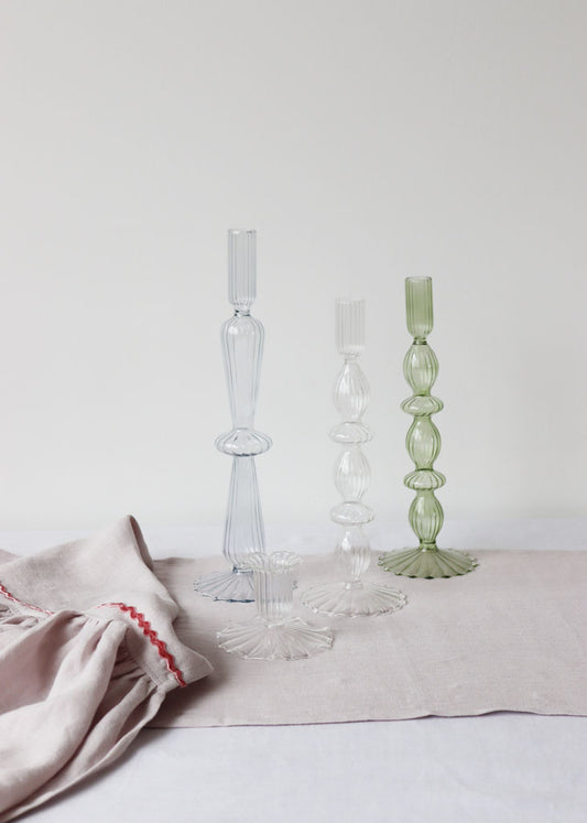 Blue, clear and green ribbed glass candle sticks